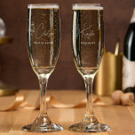 Simple Modern Personalized Bridesmaid Floral Champagne Flute<br><div class="desc">Looking for a chic, trendy, yet simple gift for your Bridesmaids? These wildflower floral modern script champagne flutes are a practical gift that they can use even after your wedding day! All text, including title and script names, can be changed. You can change the title to fit your wedding party!...</div>