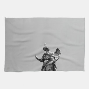 Simple, modern photo of seagull on top of statue kitchen towel