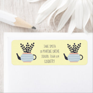 Simple modern teapot with plant pastel label
