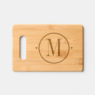 Simple monogram in a round frame charcuterie engraved cutting board