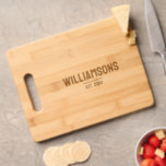 Simple Monogram Newlywed Cutting Board<br><div class="desc">A gift cutting board for newlyweds featuring a custom monogram,  their family name,  and the established year. Simply custom the name and initial,  add this cutting board to your cart,  then gift it to the happy couple.

Simple Monogram Newlywed Cutting Board
Holidayday Design   |   ©Melissa Patton - Designer</div>