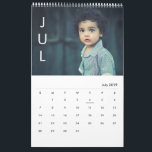 Simple Month minimalist Photo Calendar<br><div class="desc">Customize with 14 or more of your own photos including front and back covers. Month abbreviations on the left are editable as well as the style of the actual calendar layout.</div>