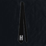 Simple Oversized Monogram Initial Black and Grey Neck Tie<br><div class="desc">Bold and simple, custom tie with your choice of initial. The design features oversized sans serif typography in grey on a black background. The template is set up for you to change the letter but, if you wish to edit the colors as well, please click "customize further" or message me...</div>