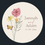 Simple Pink Yellow Wildflower Whimsical Wedding  Classic Round Sticker<br><div class="desc">Simple Pink Yellow Wildflower Whimsical Wedding Classic Round Sticker - A lovely round wedding sticker featuring delicate pink and yellow wildflowers with a graceful butterfly accent. Personalized with the couple’s names and wedding date, this charming design is perfect for sealing envelopes, favor packaging, or adding a floral touch to any...</div>