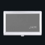 Simple Professional Gray Classic Monogram Business Card Case<br><div class="desc">Professional business card holder features sleek simple minimalist design in a gray color palette with white accents. Custom monogram initials presented on a simple grey background; positioned lower right hand corner. Shown with personalized monogram initials in a simple classic modern font, this executive business card holder is designed as a...</div>