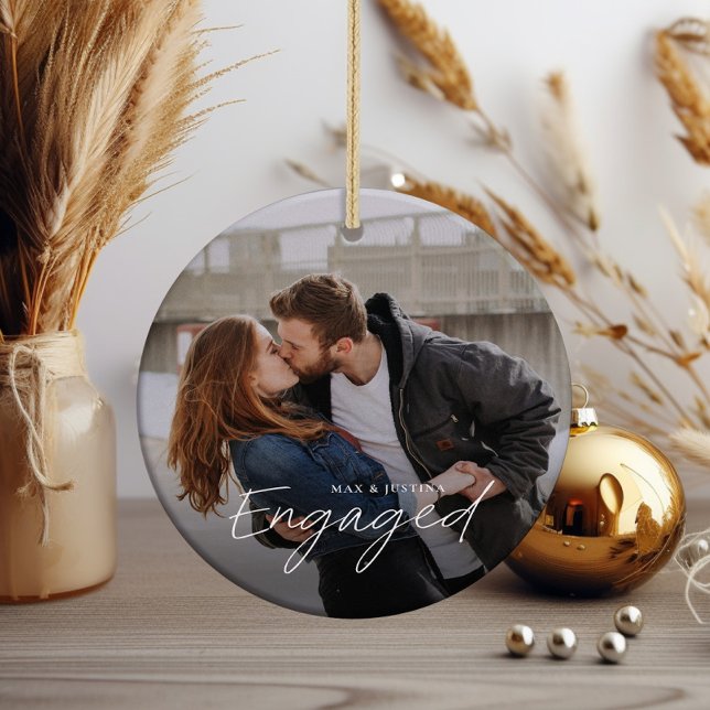 Simple Script Engaged 2 Photo Wedding Engagement Ceramic Ornament (Modern script engaged couples 2 photo wedding engagement christmas tree holiday ornament.)