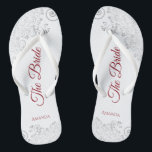 Simple Silver Lace & Red Script The Bride Wedding Flip Flops<br><div class="desc">Dance the night away with these beautiful wedding flip flops. Designed for the bride, they feature a simple yet elegant design with crimson red script lettering on a white background and fancy silver gray lace curls and swirls. Beautiful way to stay fancy and appropriate while giving your feet a break...</div>
