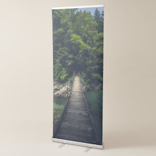 Simple suspension bridge over river Idrijca, Slove Retractable Banner