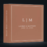 Simple Terracotta Monogram Elegant Wedding 3 Ring Binder<br><div class="desc">Simple wedding binder featuring a modern yet elegant design with your two letter monogram along with your names and wedding date surrounded by a thin border. All text is in white over a terracotta background. The fonts and background colors may be changed to any colors you wish. A chic and...</div>