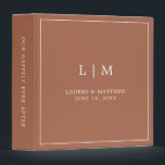 Simple Terracotta Monogram Elegant Wedding 3 Ring Binder<br><div class="desc">Simple wedding binder featuring a modern yet elegant design with your two letter monogram along with your names and wedding date surrounded by a thin border. All text is in white over a terracotta background. The fonts and background colors may be changed to any colors you wish. A chic and...</div>