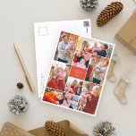 Simple Trendy Festive 8 Photo Collage Christmas Holiday Postcard<br><div class="desc">A festive holiday postcard design that features eight of your favorite photos arranged around a red rectangle with photos in landscape and portrait! Your family name and year appear in the center in a modern typography in white. Personalize this unique holiday photo collage design with your favorite photos and family...</div>