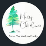 Simple, Watercolor Christmas Pine tree Classic Round Sticker<br><div class="desc">Make things simple for yourself with these pre-printed personalize sticker with your family name,  complete the package with the other items from the collection.</div>