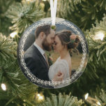 Simple White Wheat Wreath Add Wedding Photo Glass Ornament<br><div class="desc">Romantic round glass Christmas ornament to celebrate your first Christmas as a married couple. Add a photo from your wedding inside a simply drawn wheat wreath in white. A pretty greenery frame for your wedding photo.</div>