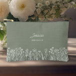 Simple Wildflower Sage Green Wedding Bridesmaid Accessory Pouch<br><div class="desc">Wildflower wedding gift for anyone in your bridal party. Easy to personalize for your bridesmaids, the mother of the bride, mother of the groom etc and you can also add the name of the bride and groom and their wedding date. Simple and elegant boho floral design with line drawn wildflowers....</div>