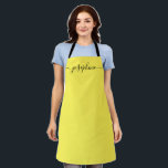 Simple Yellow black Chic Elegant Name Script Apron<br><div class="desc">Simple Yellow Black Chic Elegant Name Script Apron Brighten Her Culinary Journey: This vibrant yellow apron adorned with a beautifully contrasting black script isn’t just a garment; it’s a cheerful companion to her baking, cooking, or gardening endeavors. The personalized name, scripted in elegant long-tail embellishments, brings a chic and elegant...</div>