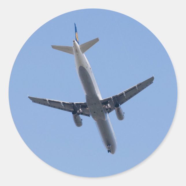 Single airplane on the blue sky background classic round sticker (Front)