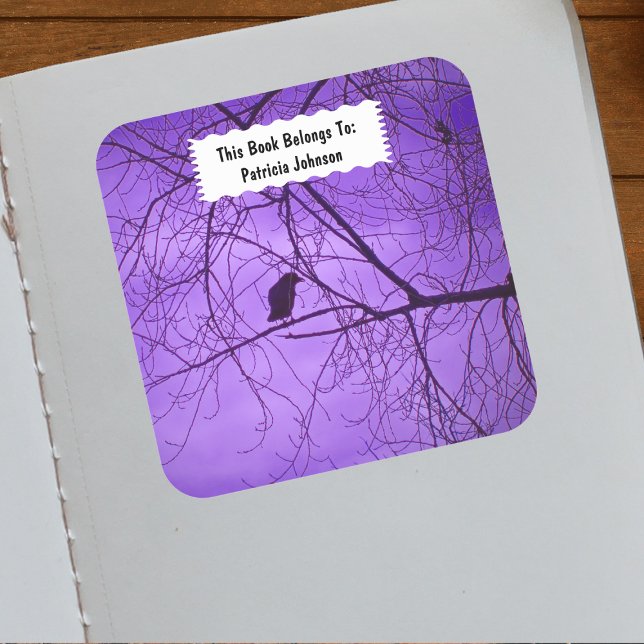 Single Black Silhouette Crow in Black Trees Purple Square Sticker (Single black crow sitting in tree branches against purple sky on book ownership label.)