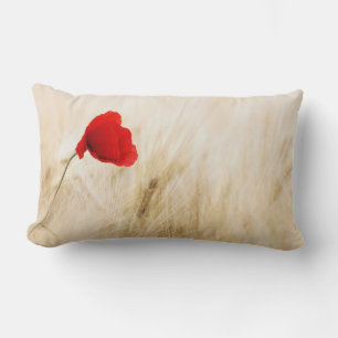 Single Red Poppy in a Grassy Field Lumbar Pillow