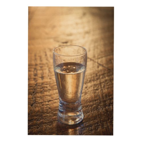 Single shot of Tequila on wood table Wood Wall Decor