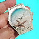 Single Starfish Beach Scene Watch<br><div class="desc">Single starfish on the beach, seaside watch face image. Anyone who loves the seacoast will appreciate this beautiful beach scene with turquoise ocean water and gentle waves along the smooth beach sand. A single, brown sea star decorates the bottom corner. This adult, silver band watch can be changed to a...</div>