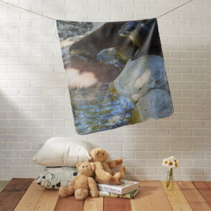 **"Sips by the Stream: Otters Drinking from River Baby Blanket