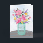 Sister Mother's Day Jar Vase with Flowers Card<br><div class="desc">Celebrate with your Sister on Mother's Day with this pretty mason jar vase of flowers. Sitting on a table with a brown subtle blue striped table cloth. Watercolor looking flowers are soft and cheery for Mother's Day to your sister!</div>