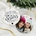 Sisters Connected At Heart Photo Keepsake White Ceramic Ornament<br><div class="desc">A special and memorable photo ornament and quote gift for sisters. The design features a beautiful sister quote "Side By Side Or Miles Apart Sisters Are Always Close At Heart" Beautifully design with hearts and faux gold snowflakes that frame the quote. Customize with the year and a full photo on...</div>