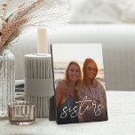 Sisters Handwritten Script Overlay Vertical Photo Plaque<br><div class="desc">Keep a constant reminder of your most important priority nearby with this sweet family keepsake photo plaque. Add a favorite vertical photo,  with "sisters" overlaid in white handwritten script lettering.</div>