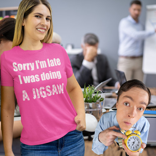 A pink t shirt that say, sorry i'm late i was doing a jigsaw