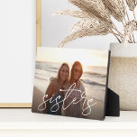 Sisters | Script Overlay Horizontal Photo Plaque<br><div class="desc">Keep a constant reminder of your most important priority nearby with this sweet family keepsake photo plaque. Add a favorite horizontal or landscape oriented photo,  with "sisters" overlaid in white handwritten script lettering.</div>