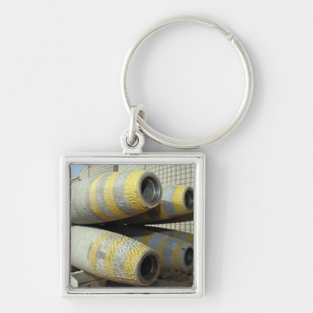 Six GBU-12 bombs sit in a rack Keychain (Front)