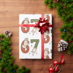 Six Seven 67 6 7 Christmas Santa Elf Meme Wrapping Paper<br><div class="desc">Wrap your gifts with laughter this holiday season using this Santa and Elf 67 Christmas Meme Wrapping Paper. Featuring Santa’s gloved “OK” hand forming the “6” and an elf’s playful gesture creating the “7, ” this design blends vintage charm with meme-worthy humor. Perfect for Christmas parties, gag gifts, or anyone...</div>