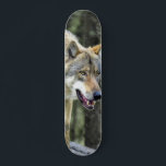 Skateboard Gray wolf predator watching<br><div class="desc">The skateboard has a specific design, representing a predatory gray wolf. On the surface of the skateboard, you can see the visual image of this wolf, who's looking at his environment. The wolf's depiction suggests a shocking and detailed image, intended to convey the image of a majestic and captivating predator....</div>