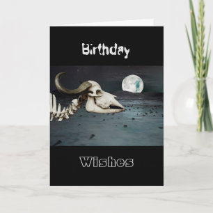 Skeletal buffalo in a moonlit landscape card