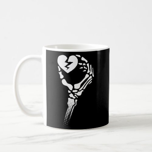 Skeleton Hand Holding Broken Heart Coffee Mug