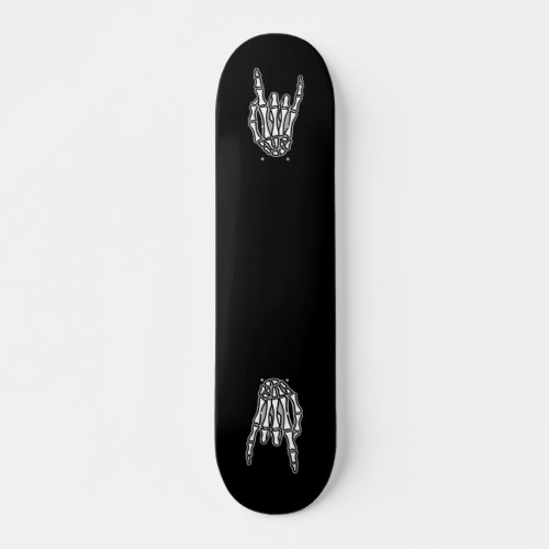 Skeleton hand rock and roll skateboard