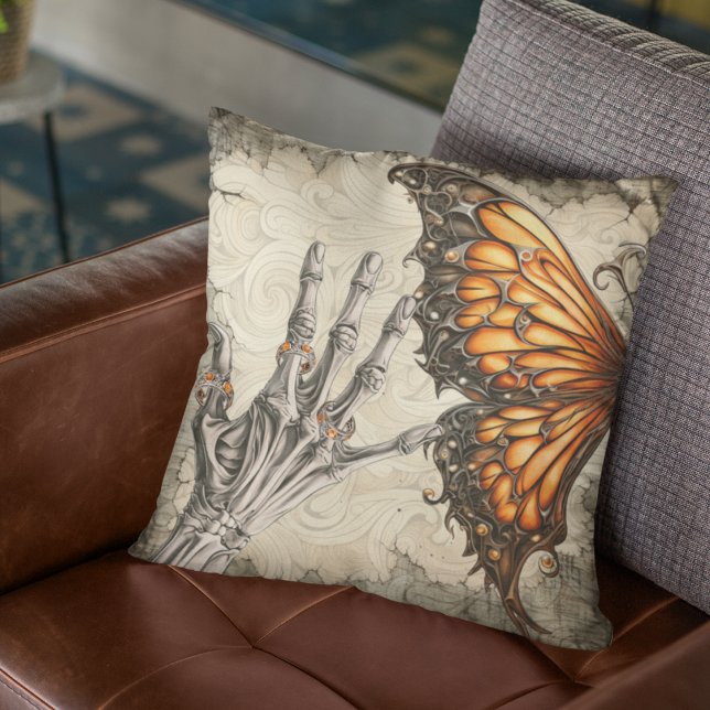 Skeleton Hand with Victorian Rings | Butterfly Throw Pillow (Haunting skeleton hand with victorian rings and steampunk butterfly on throw pillow for Halloween. )