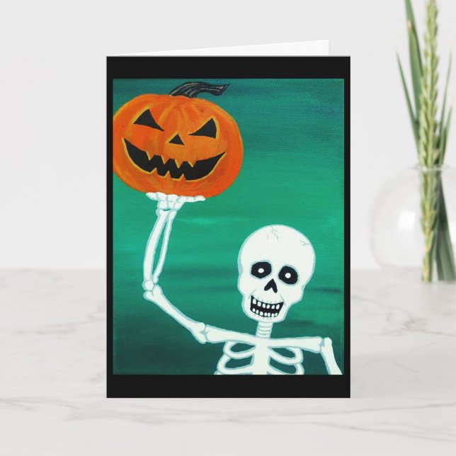 Skeleton holding Pumpkin Halloween Greeting Card (Front)