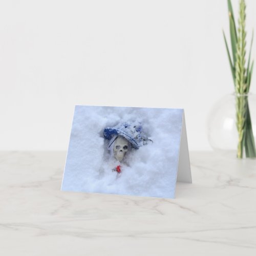 Skeleton in fancy hat in snow card