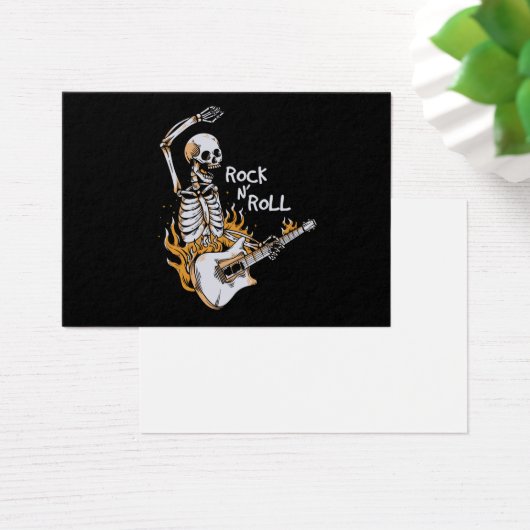Skeleton playing guitar with fire (Desk)