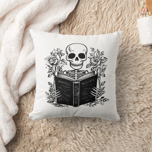 Skeleton reading book throw pillow