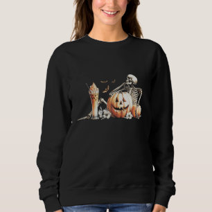 Skeleton with pumpkin and drink. Halloween. Sweatshirt