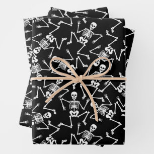 Skeletons on Black Wrapping Paper Sheets