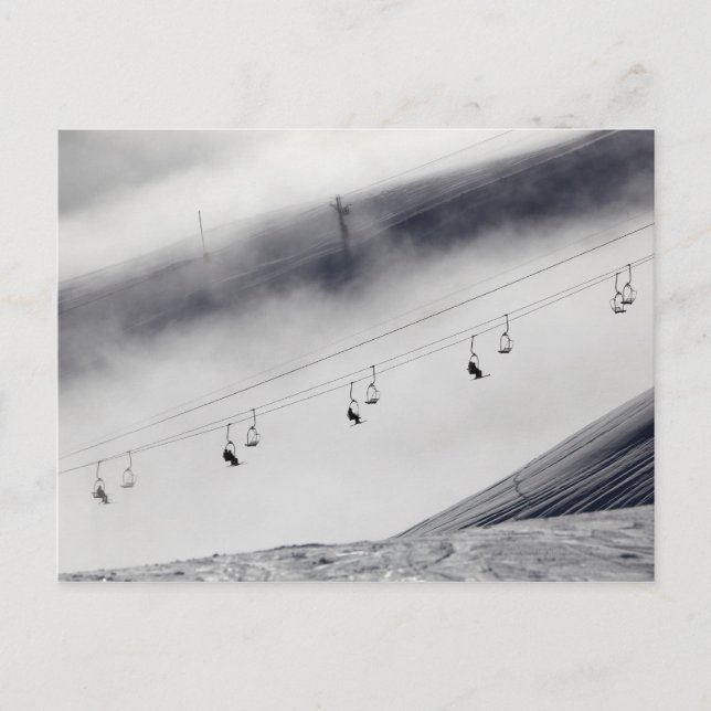 Skiers on a chair lift postcard (Front)