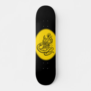 Skull - devil heads with snake skateboard deck