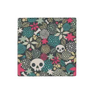 Skull in flowers stone magnet