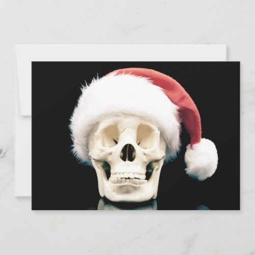Skull wearing a santa hat holiday card