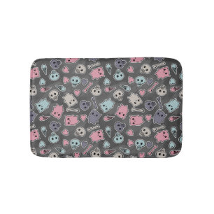 Skulls, and hearts on black background bath mat