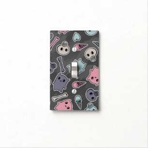 Skulls, and hearts on black background light switch cover