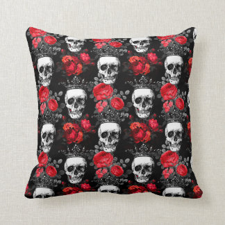 Skulls crowns and faded red roses on a dark black throw pillow